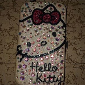Hello Kitty IPhone 5s case with wallet on inside!